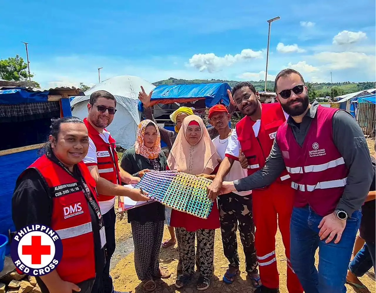 PH Red Cross, partners provide aid worth P3-M to storm Paeng-affected families