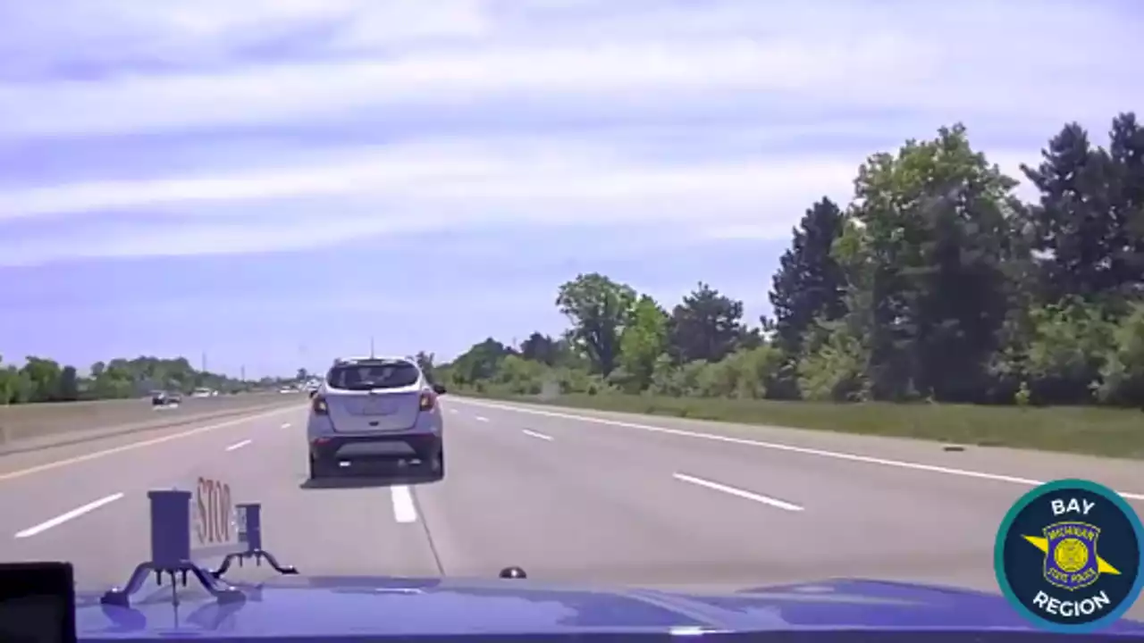 VIDEO: 10-year-old in stolen car swerving on I-75 pulled over by MSP