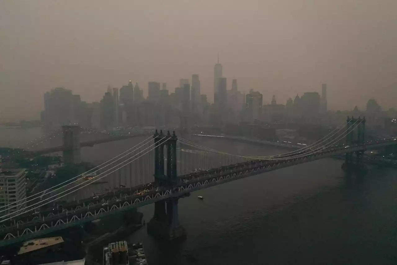 Photos show New York haze caused by Canadian wildfire smoke