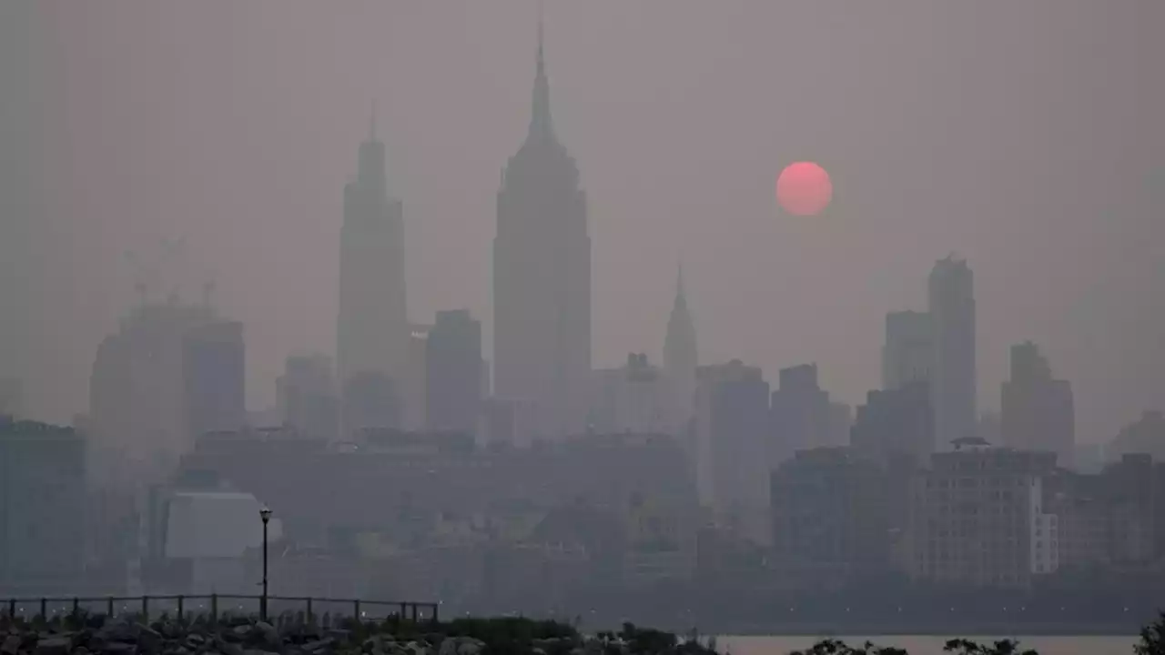 'I can taste the air': Canadian wildfire smoke spreads hazardous haze at home and in the US