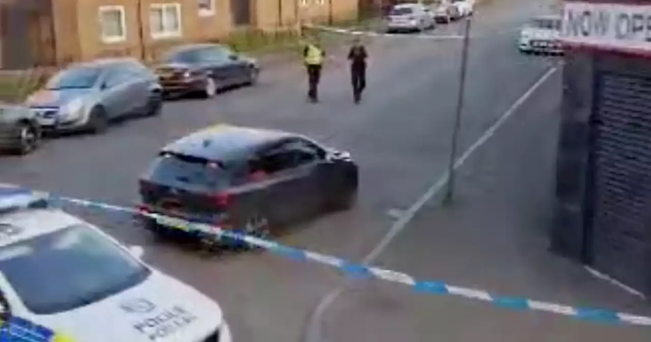 Police lockdown Glasgow street as teenager rushed to hospital after attack