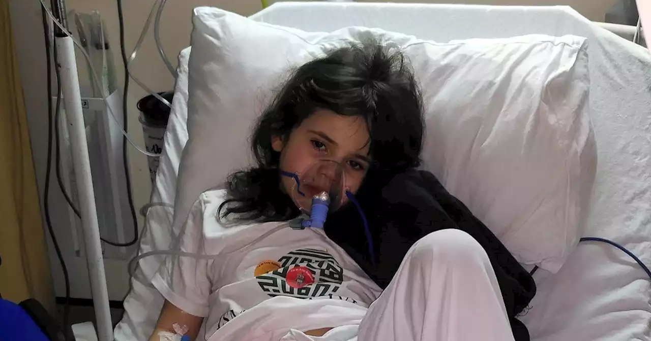 Schoolgirl survives strep A pneumonia and walks for hospital that saved her