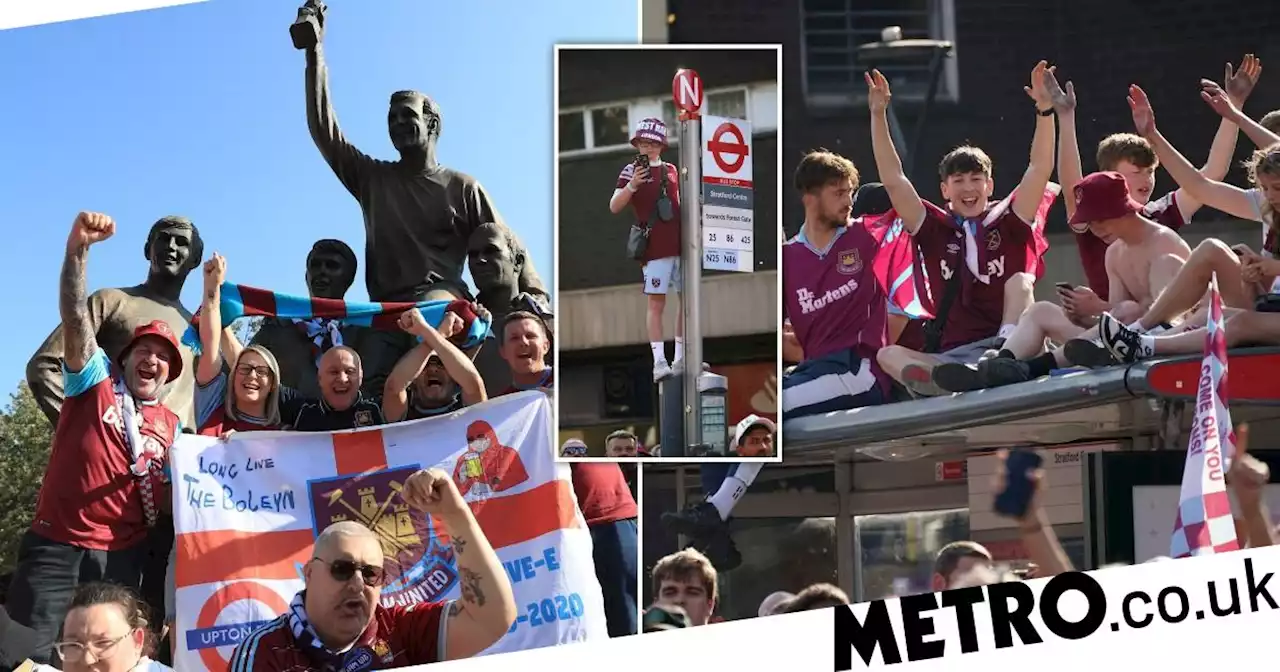 Thousands of West Ham fans line streets of east London to cheer on cup winners