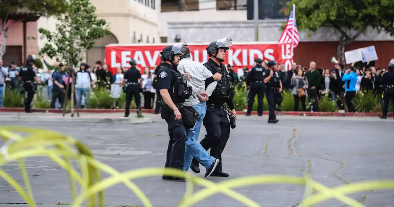 Three arrested at protests outside an L.A. school board meeting about Pride Month