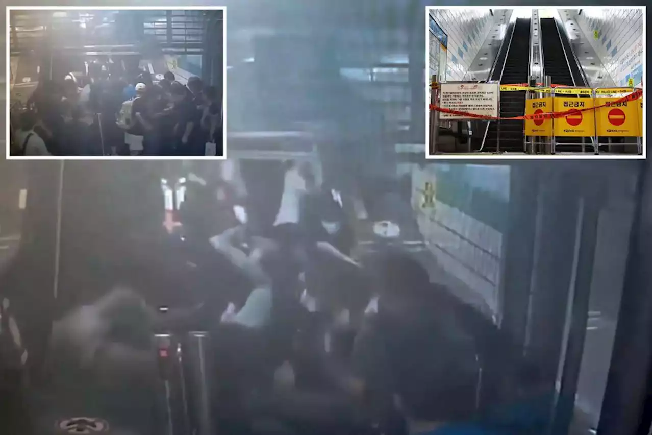 Harrowing video shows moment escalator packed with riders suddenly reverses, injuring 14