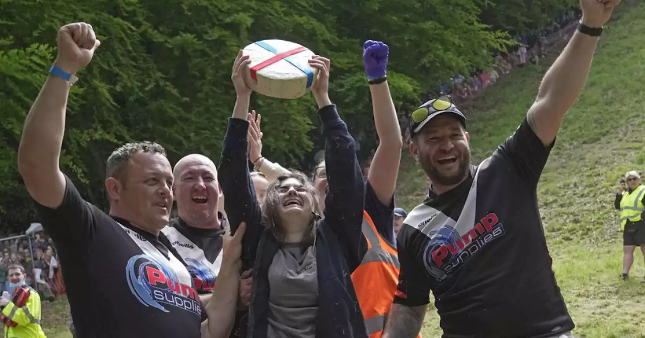 Woman knocked unconscious as she wins famous cheese-rolling race