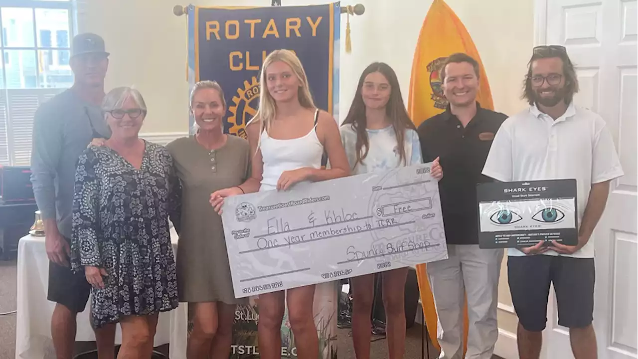 Shark attack victim honored by Florida community, given gift certificate to buy new surfboard