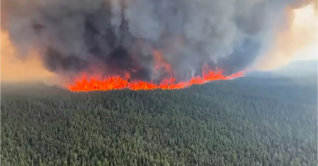 Wildfires spread in British Columbia, Quebec sees signs of progress