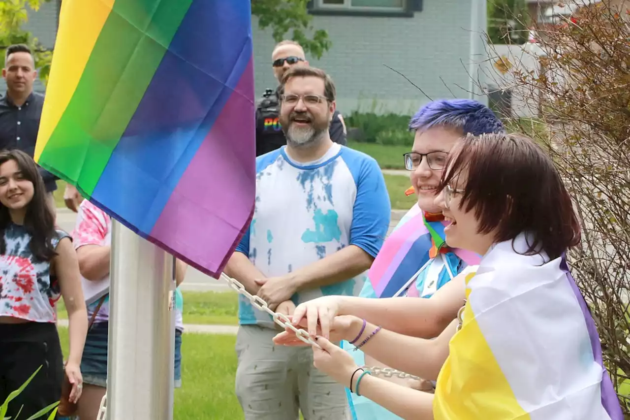 Pride flag flies at Catholic board, symbolizing allyship