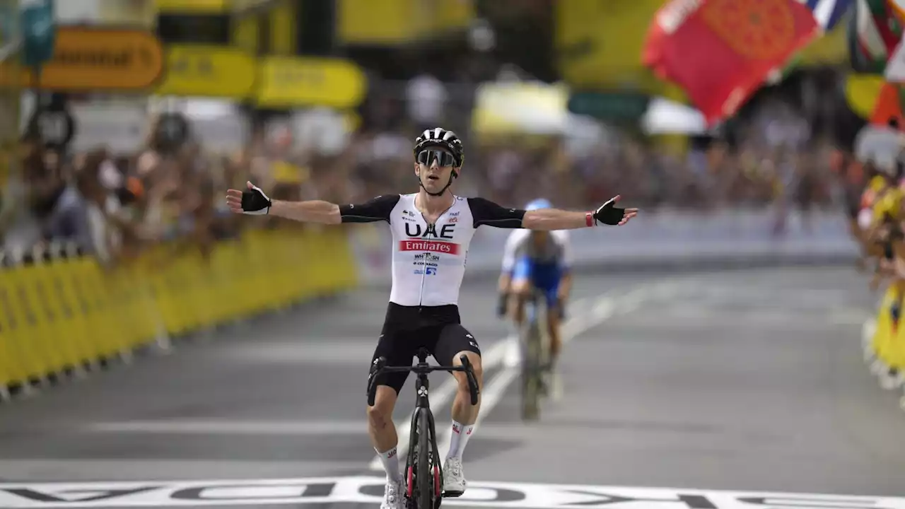 Adam Yates beats twin brother Simon Yates to win first stage of Tour de France