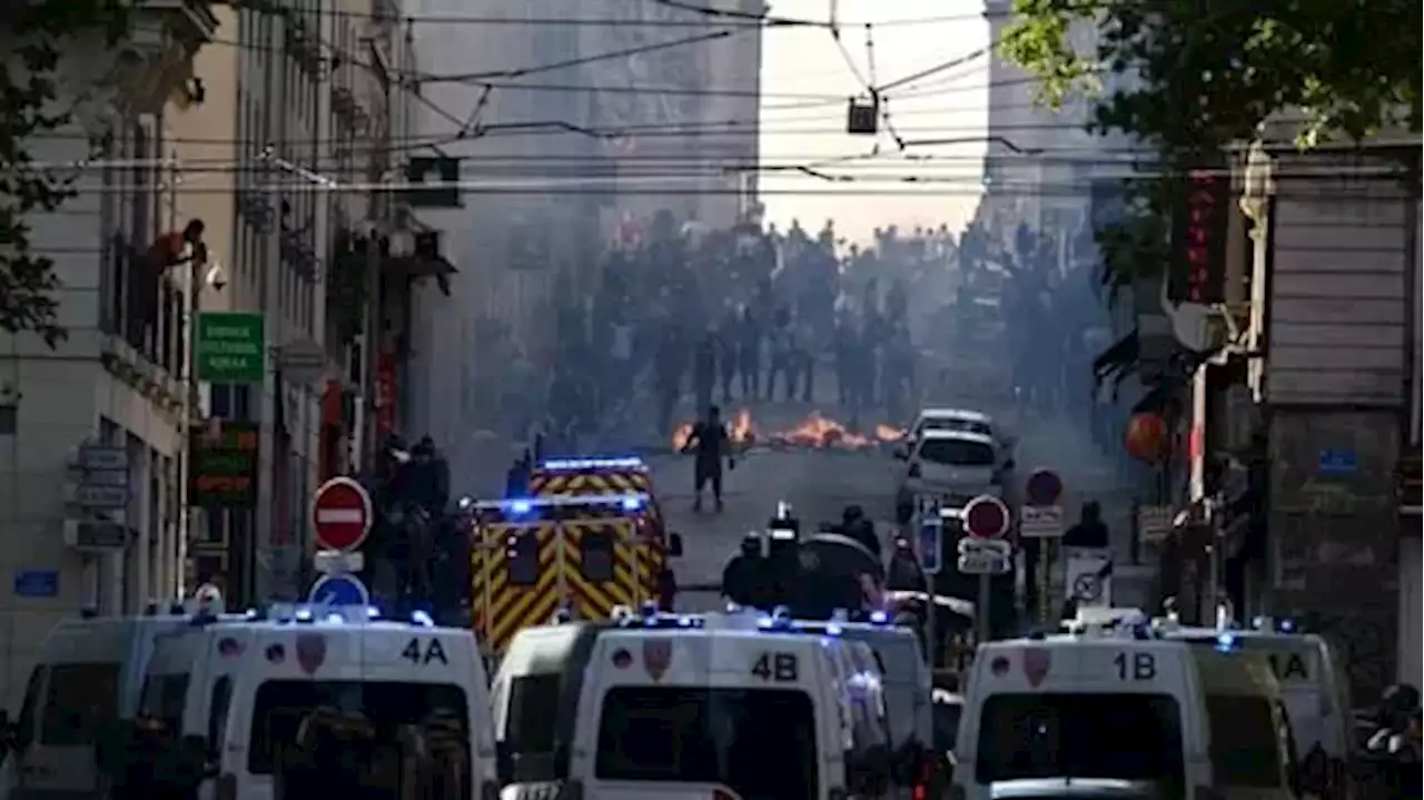 Police report 1,300 French riot arrests as teen's funeral begins