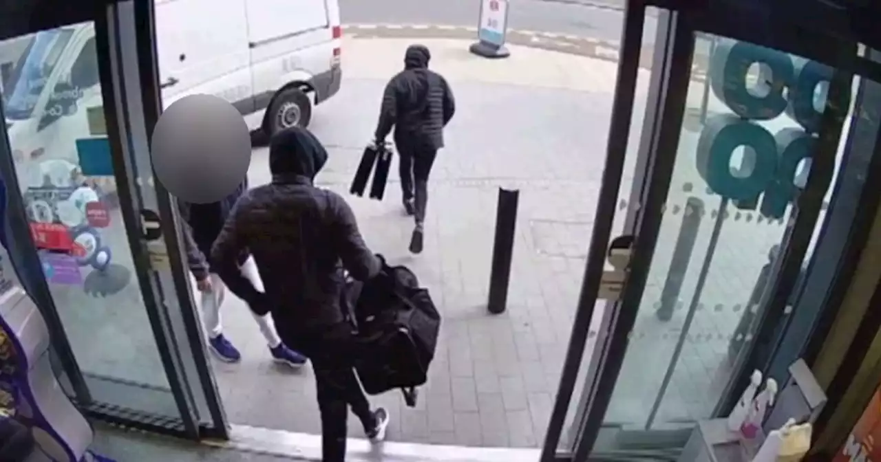 Terrifying moment £250k armed robbery gang caught leaving with huge haul of cash