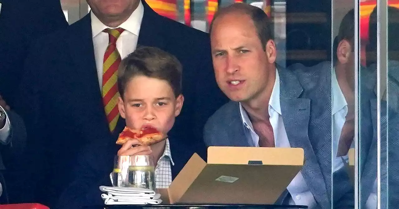 Prince George tucks into pizza while he watches cricket with dad William