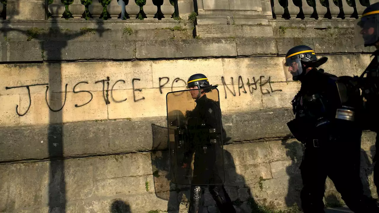 Young man who fell from building during riots has died - as France deploys 45,000 police to tackle violence