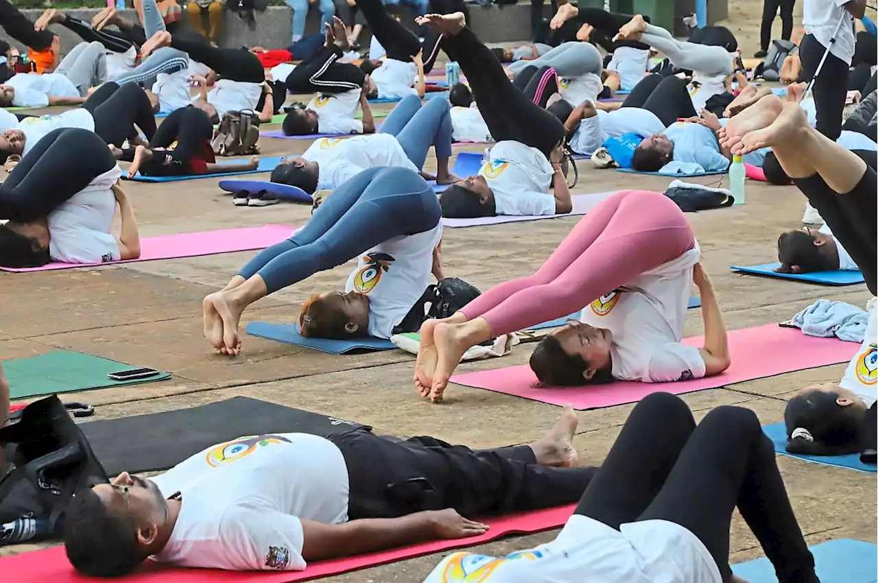 Mass yoga session bringing positive vibes