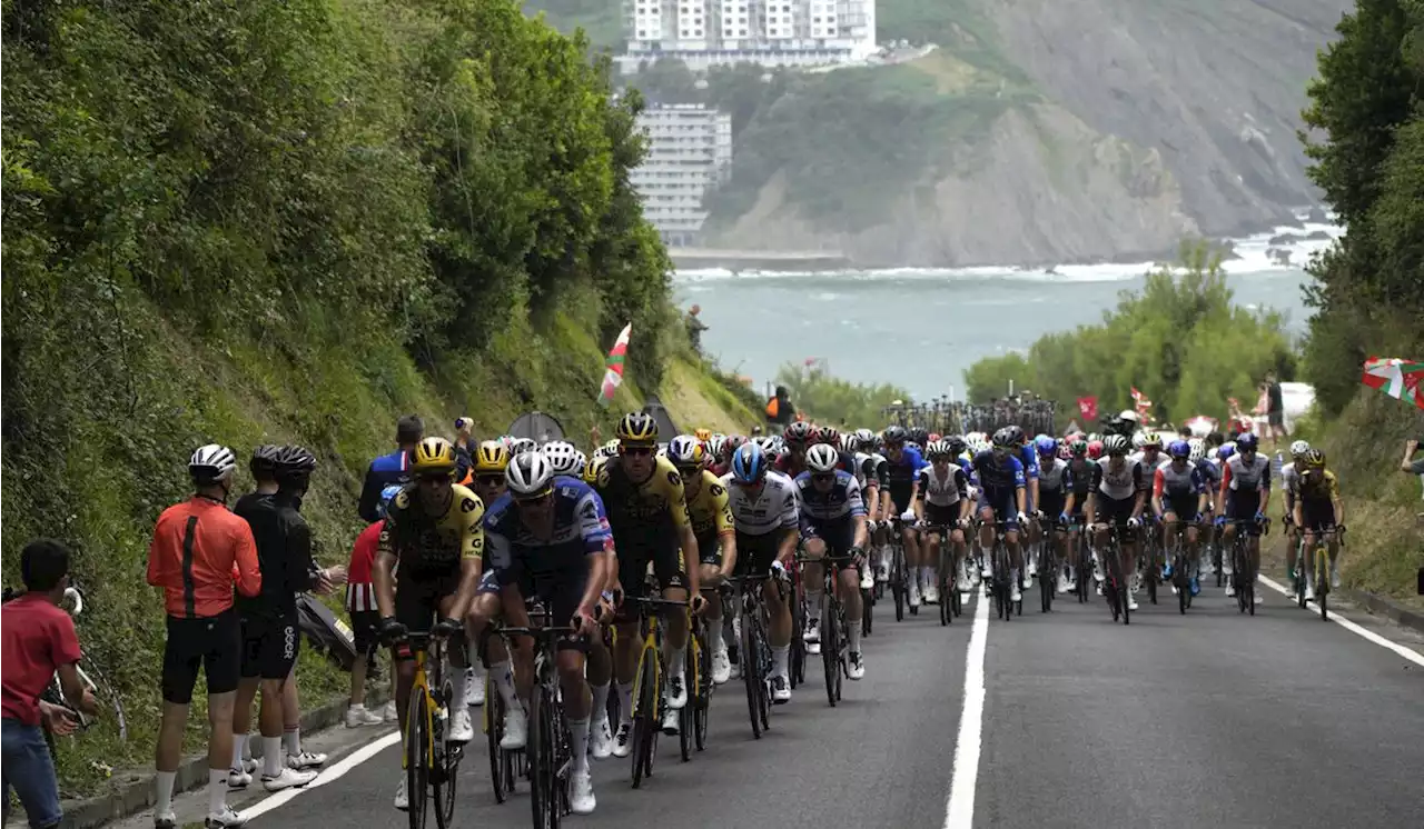 Adam Yates beats twin brother Simon Yates to win initial stage of Tour de France