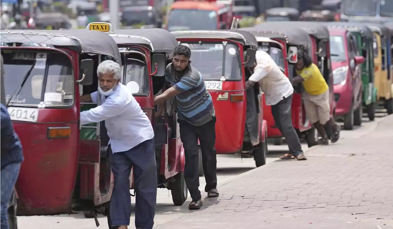 Sri Lanka’s Parliament approves a debt restructuring plan in an attempt to overcome economic crisis