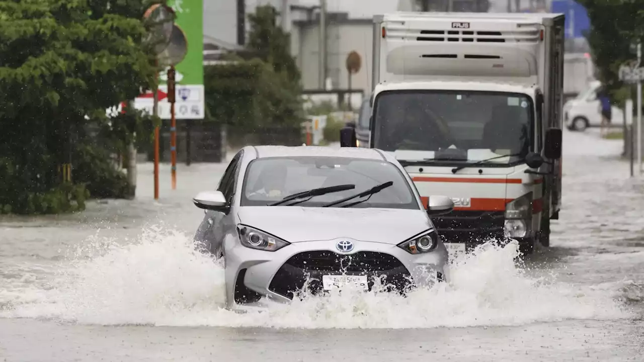 Heavy rains cause flooding and mudslides in southwest Japan, leaving 2 dead and at least 6 missing