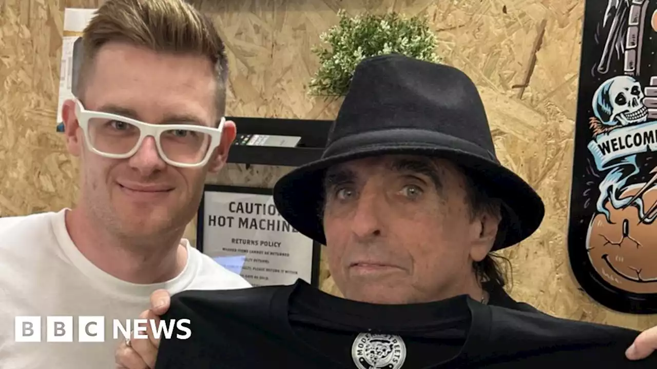 Alice Cooper pops into Manchester shop to buy Johnny Depp a T-shirt