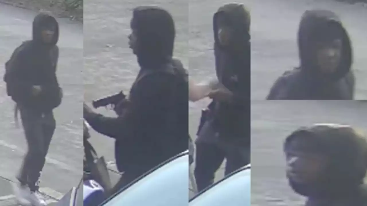 VIDEO: Frustrated robber holds woman at gunpoint, throws her cell phone on ground