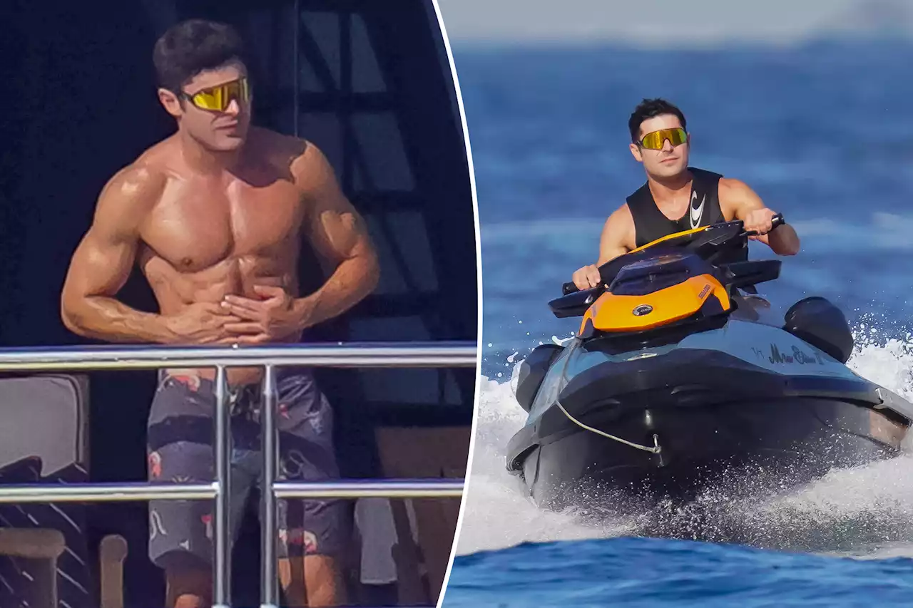 Zac Efron shows off ripped physique as he gets wet and wild on luxury yacht in St. Tropez