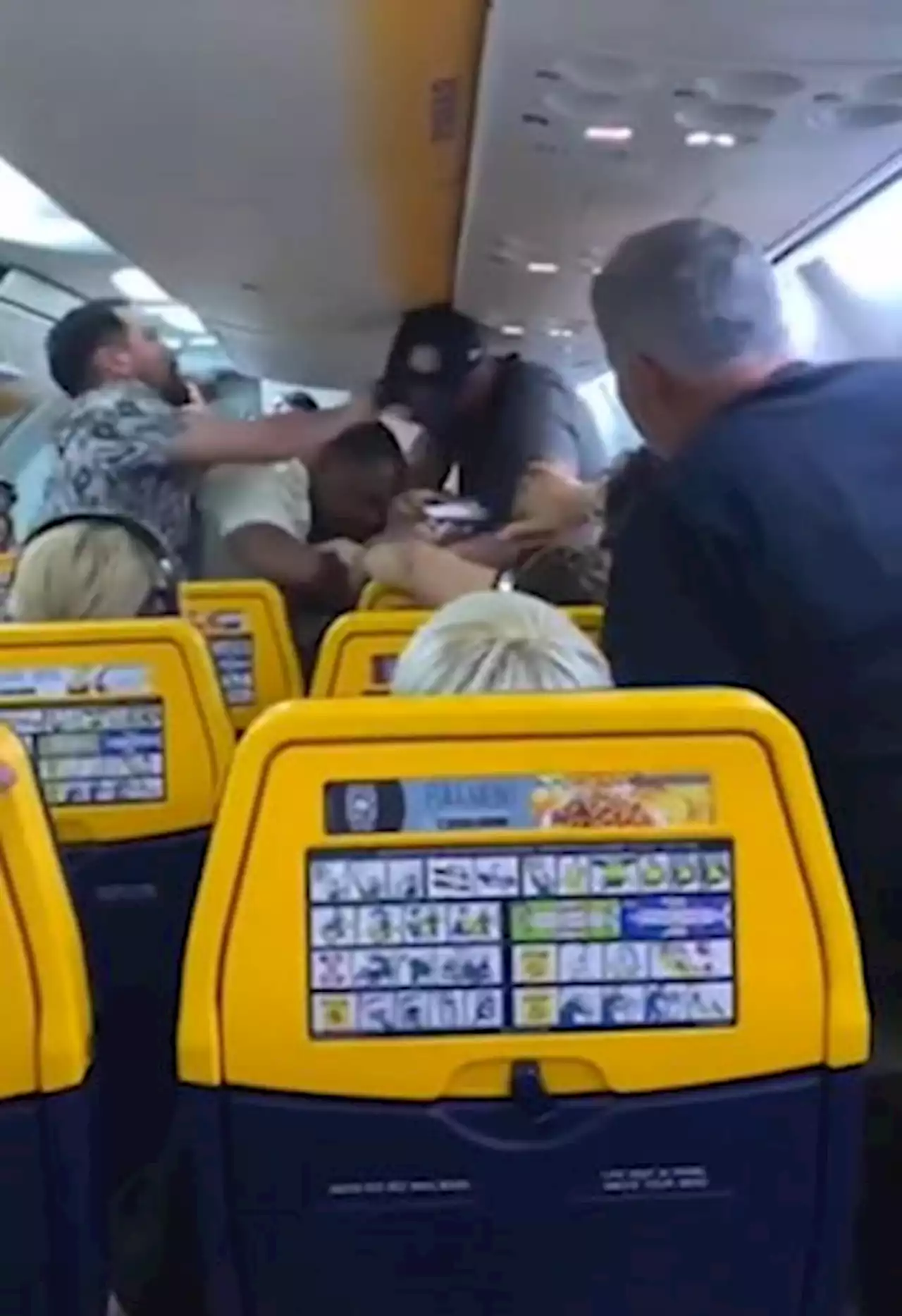 Shocking moment brawl breaks out on Ryanair plane 'in row over window seat'