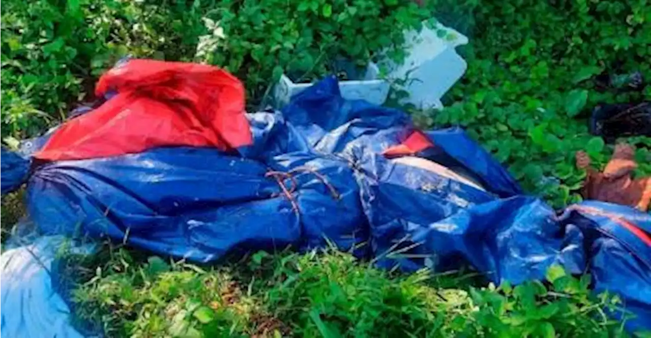 Two bodies found bundled near garbage dump in Cheng, Malacca