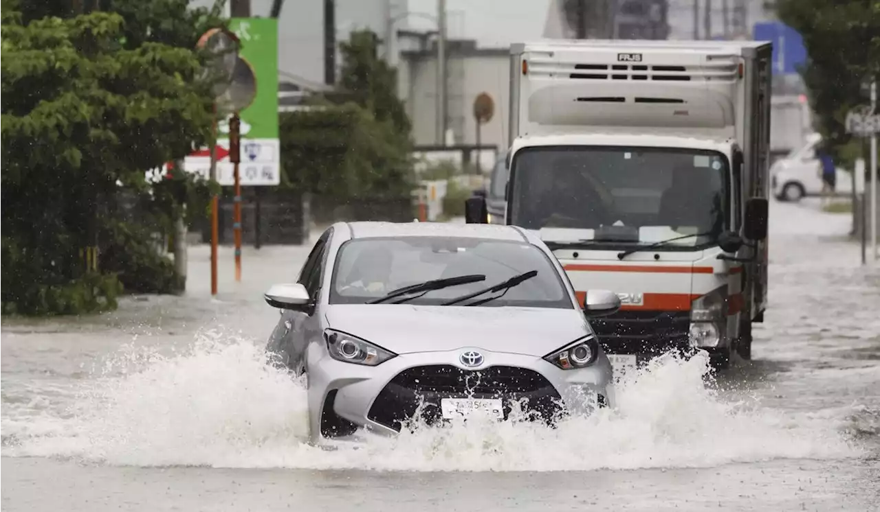 Heavy rains cause flooding and mudslides in southwest Japan, leaving 2 dead and at least 6 missing