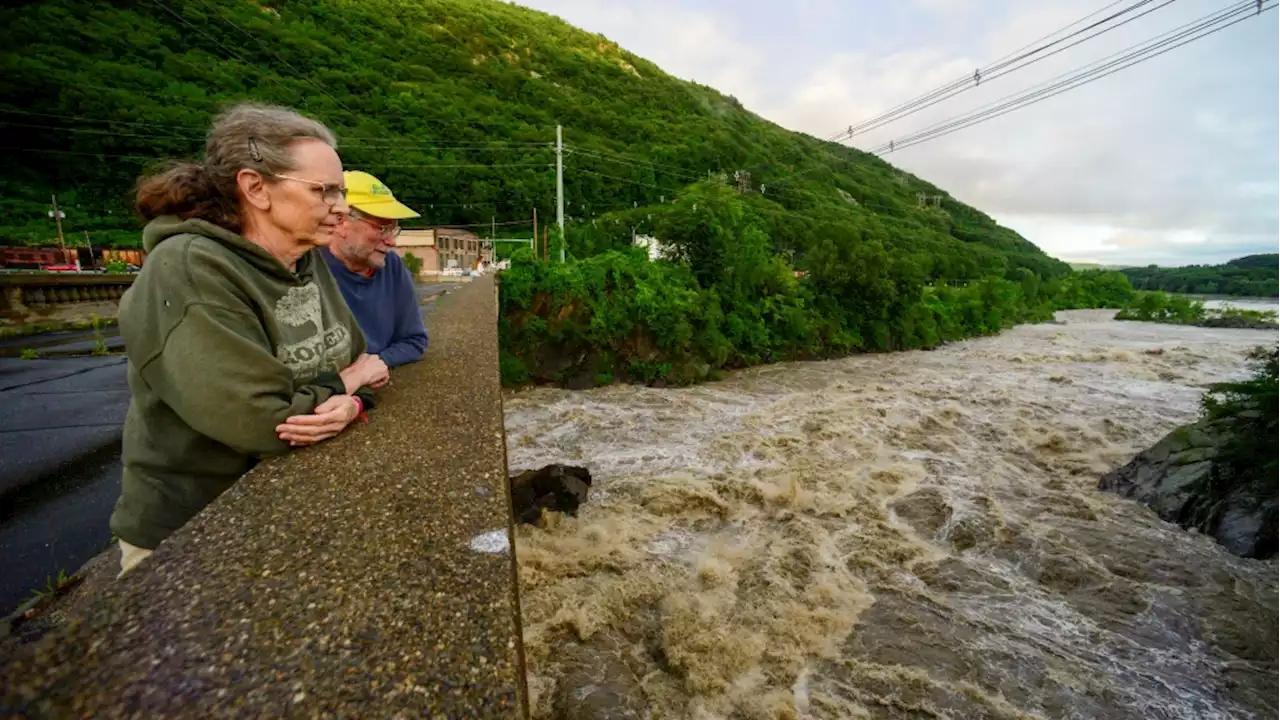 A surging river threatens Vermont's capital as crews rescue more than 100