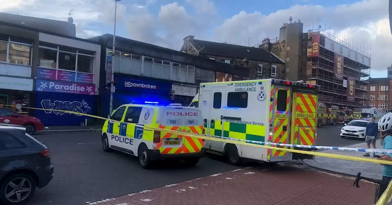 Firefighters tackling 'well alight' blaze in Glasgow as cops cordon off road