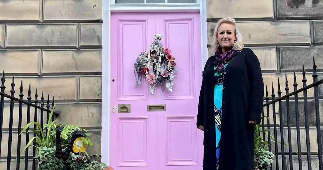 Pink door row Scot could face second £20k fine after repainting it 'off-white'