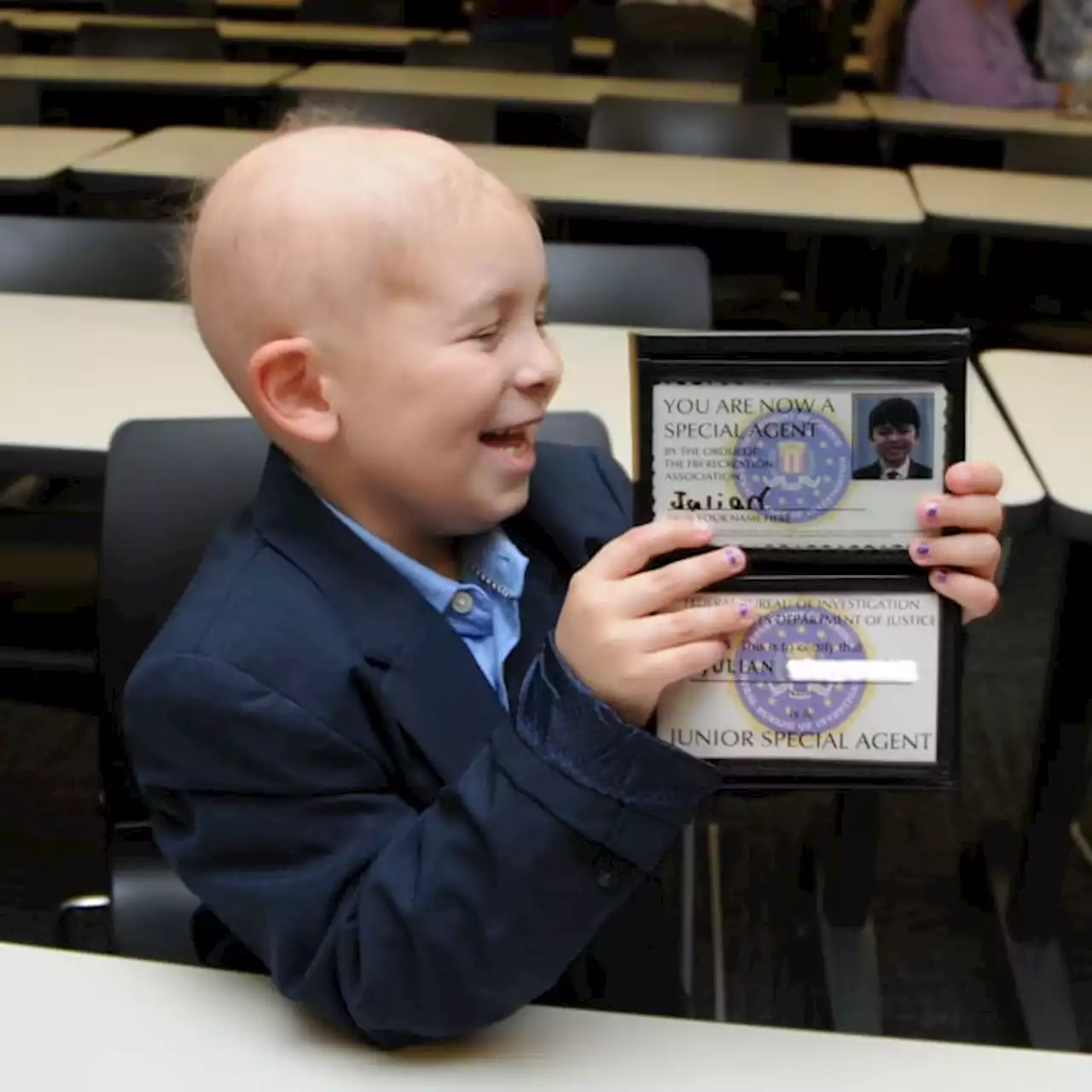 Boy fighting brain cancer sworn in as honorary Junior Special Agent by Houston FBI