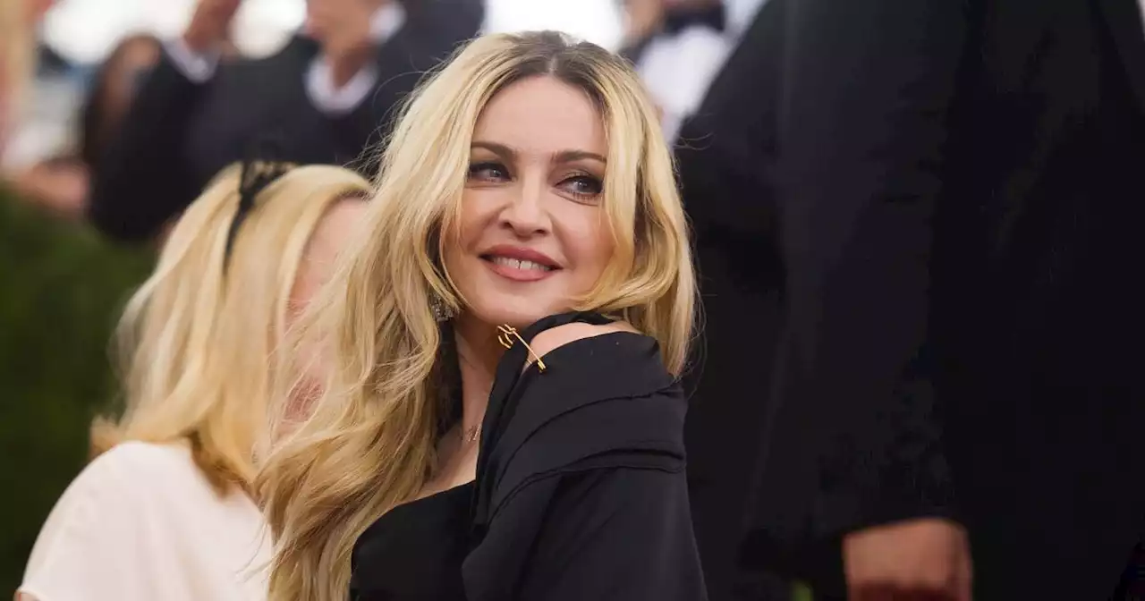 Madonna says she's 'on the road to recovery' but is postponing Celebration tour