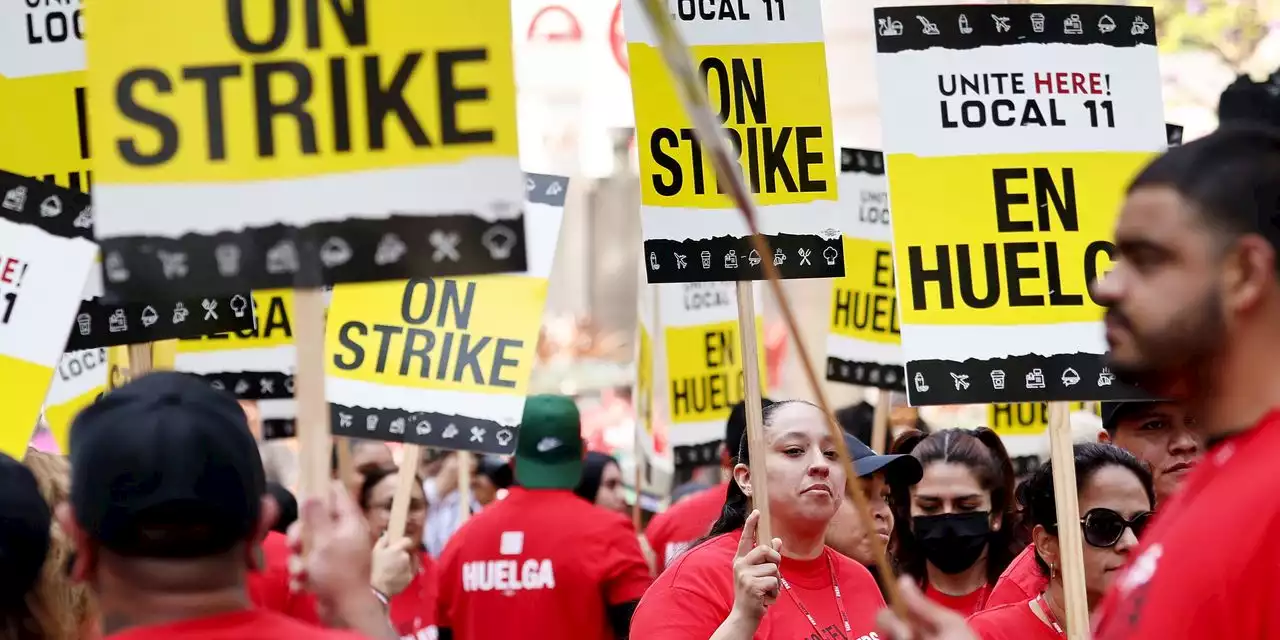 Thousands more Los Angeles hotel workers strike, pushing for wage hikes and better workloads