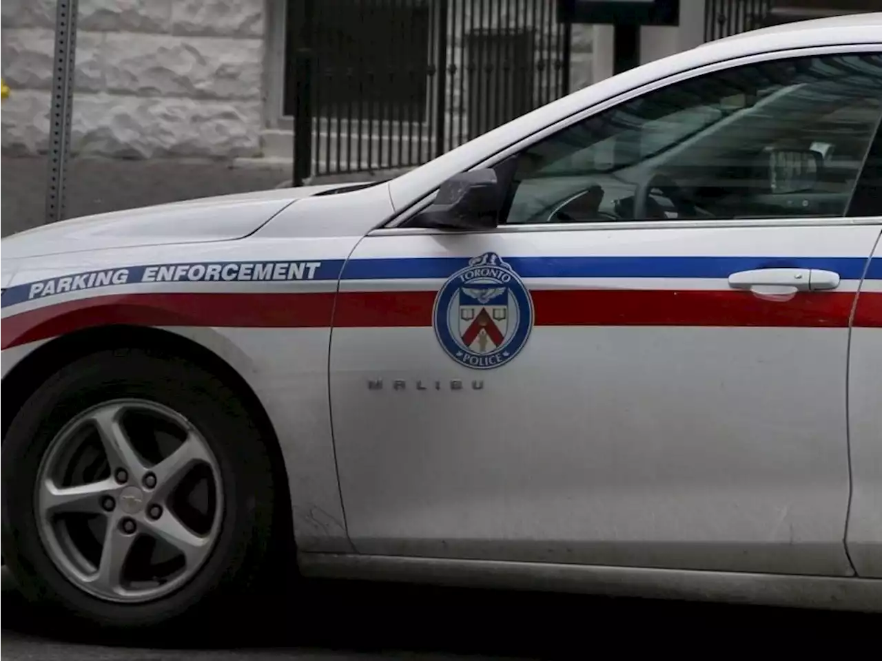 Toronto men charged with assault after incidents involving parking officers