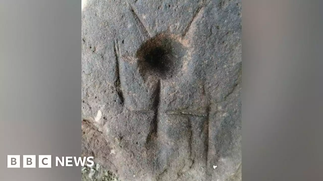 Archaeologists revisit mysterious carving site on Shropshire hill