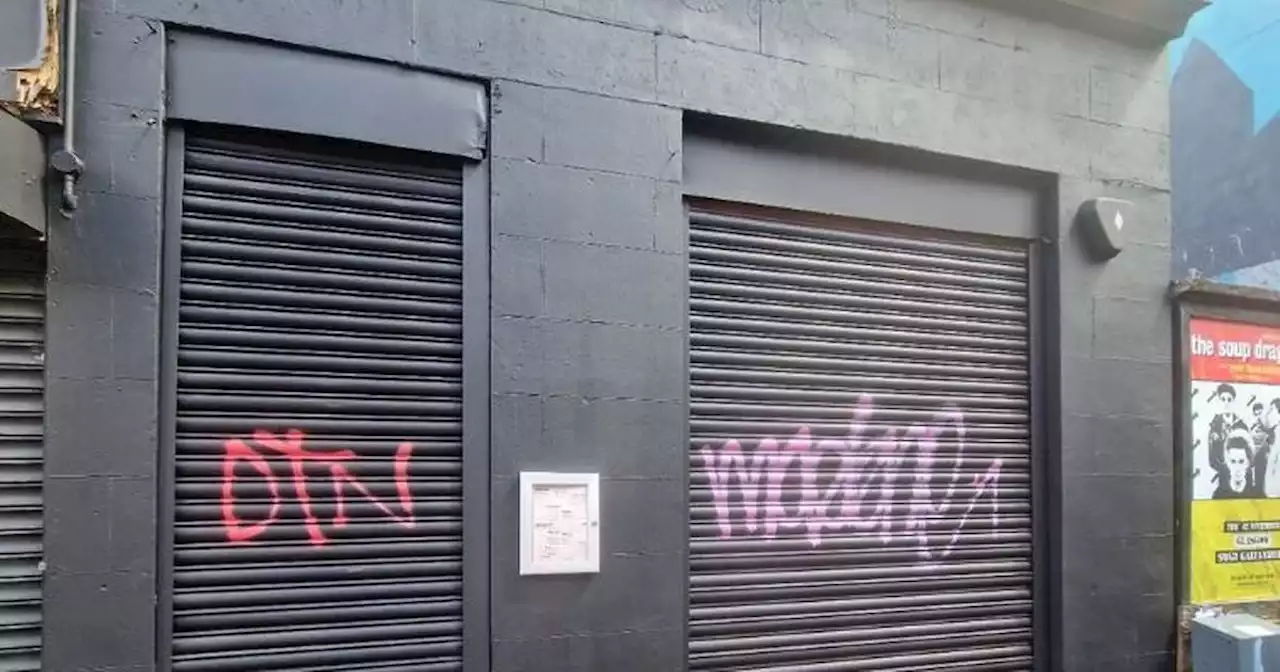 Glasgow cafe tells 'Banksy stick to the GOMA' as newly painted front defaced