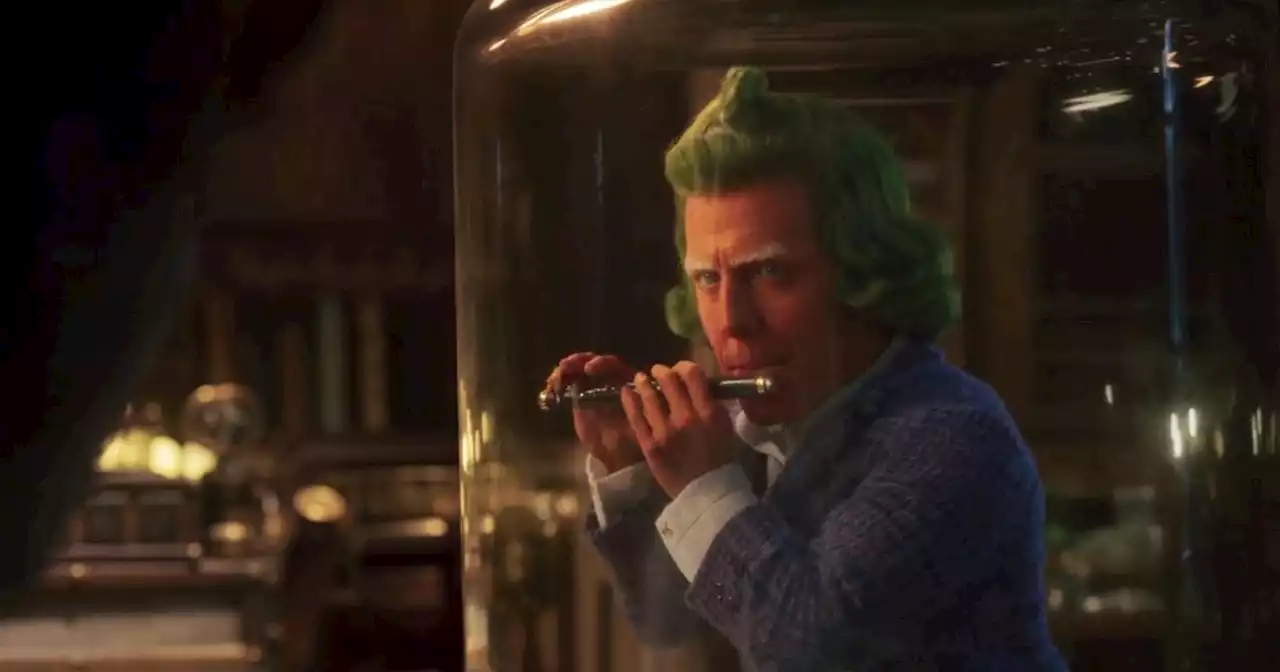 Hugh Grant unveiled as tiny green and orange Oompa-Loompa in Wonka trailer