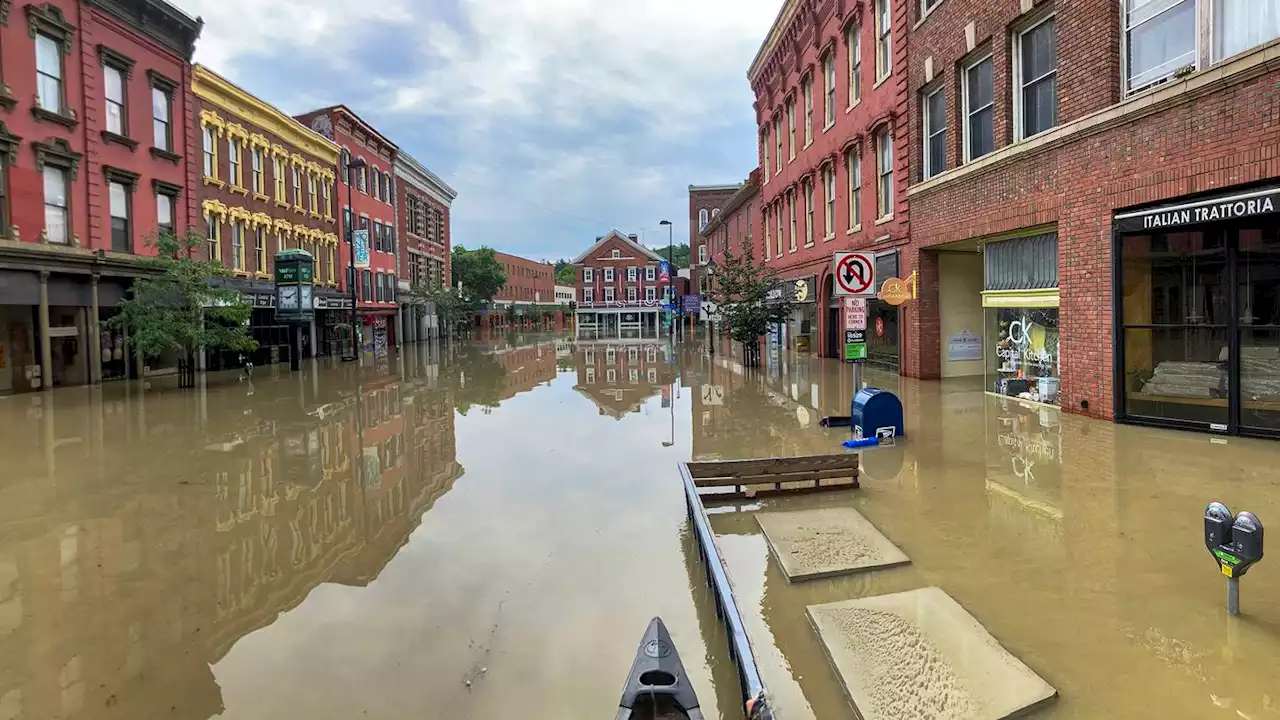 A surging river floods Vermont's capital as crews rescue more than 100 people