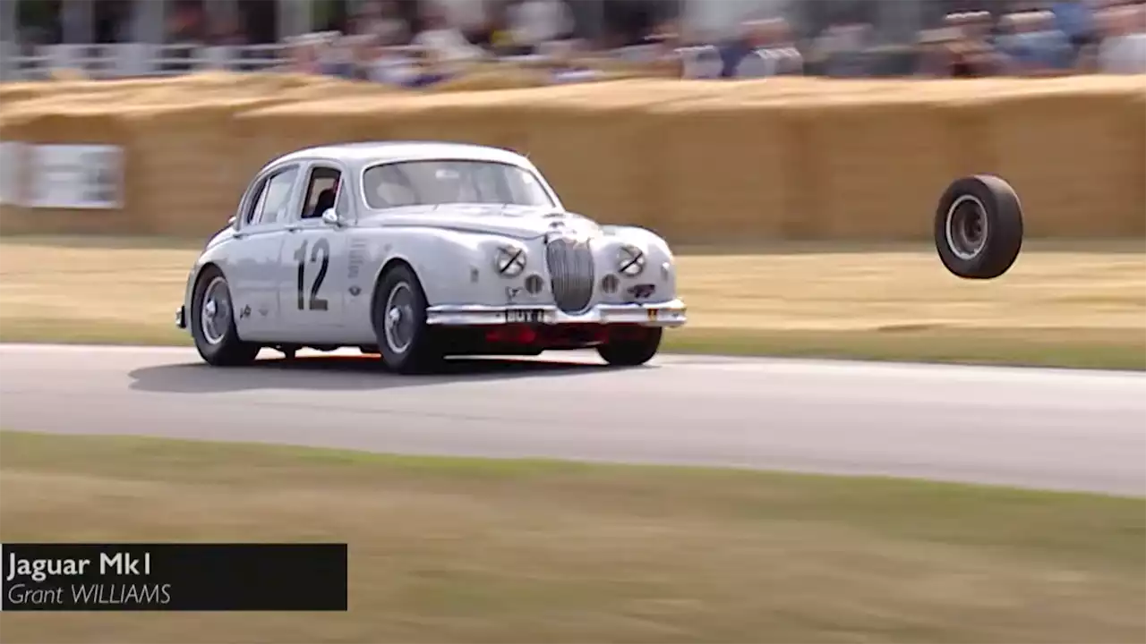 Watch a Vintage Jaguar's Loose Wheel Fly Into Goodwood Crowd