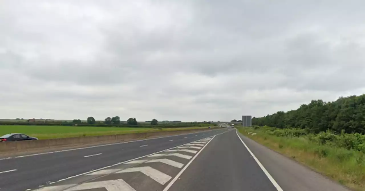 Man seriously injured in tractor and car crash which closed road