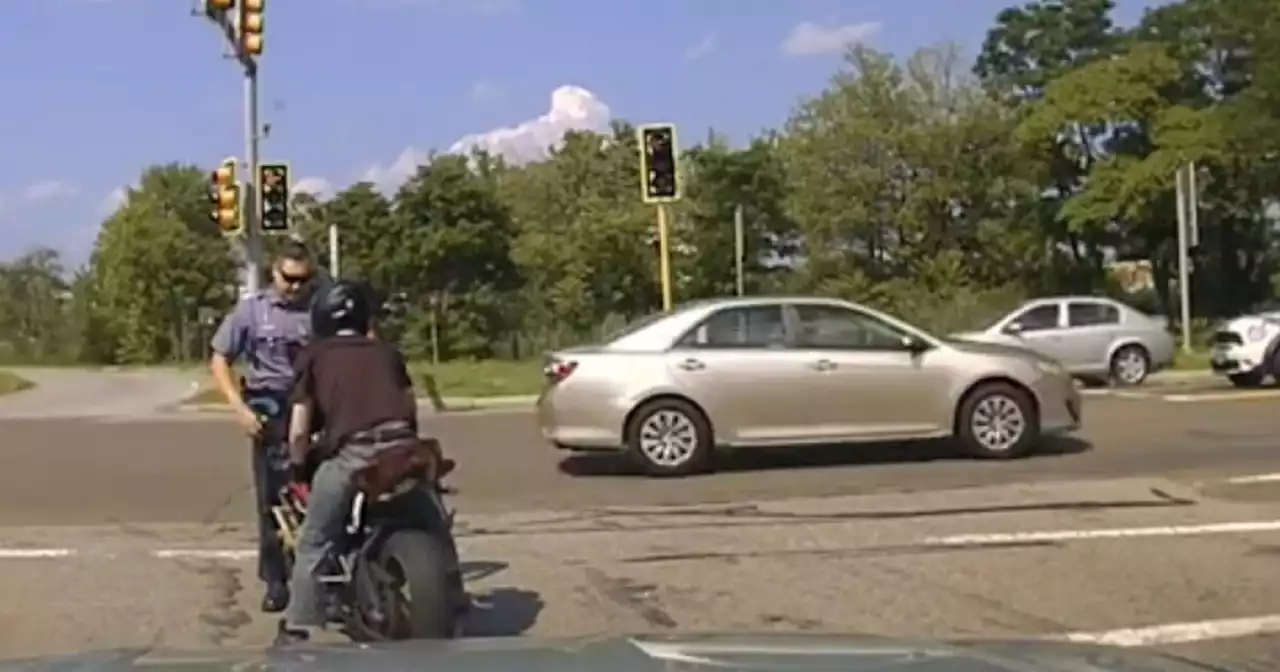 Motorcyclist pushes trooper into traffic while fleeing traffic stop