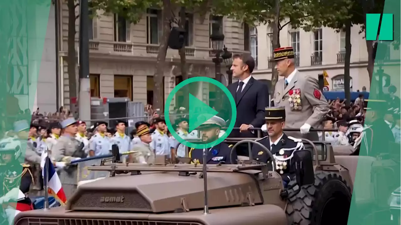 Applaudi en descendant les Champs-Élysées, Macron n’a pas échappé à quelques huées