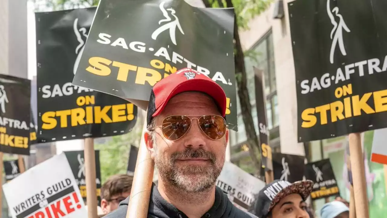 Jason Sudeikis und Susan Sarandon demonstrieren