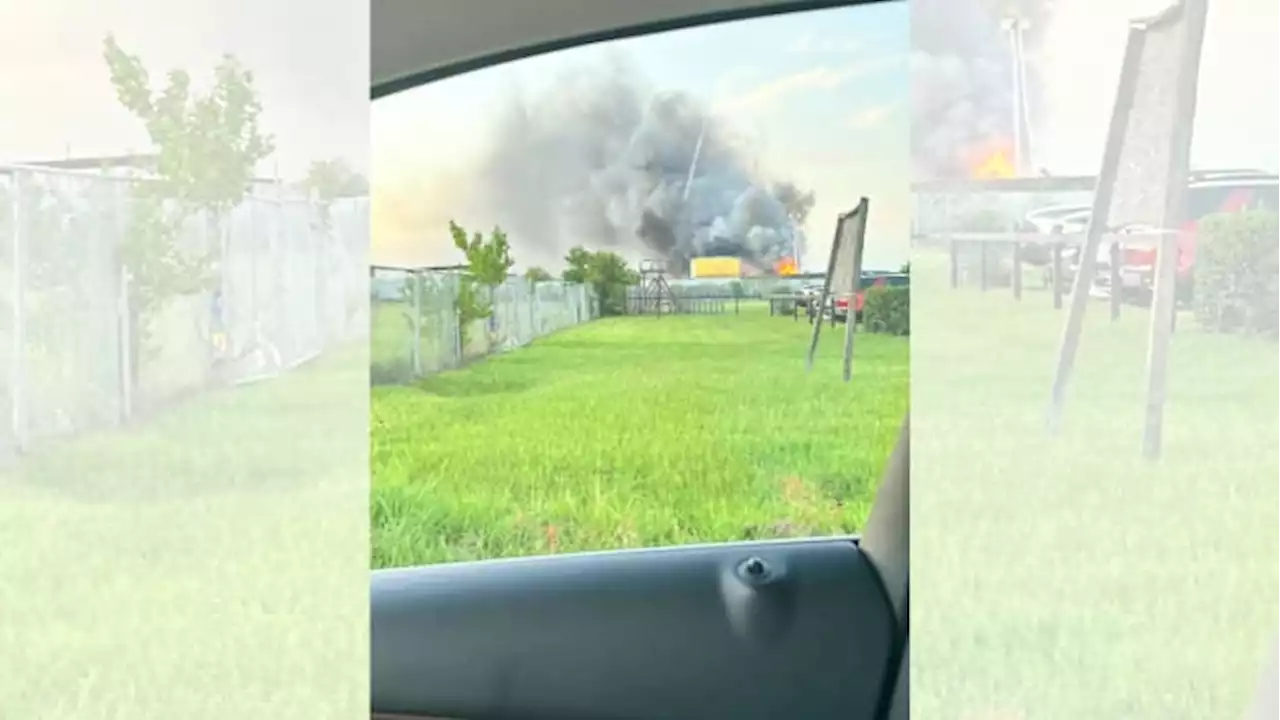 Crews at scene of burning scrap metal yard in west Harris County