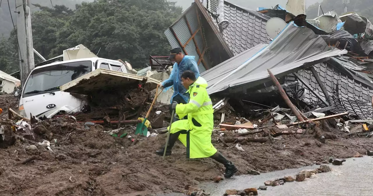 Landslides and floods kill at least 22 as South Korea battered by torrential rains