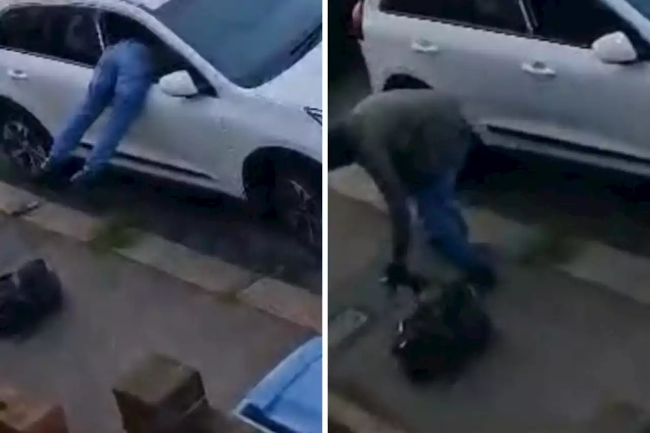 Man finds thief's legs sticking out his neighbour's car window