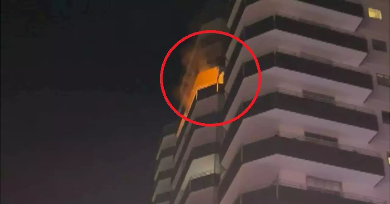 Astonishing sight as fire rips through high-rise