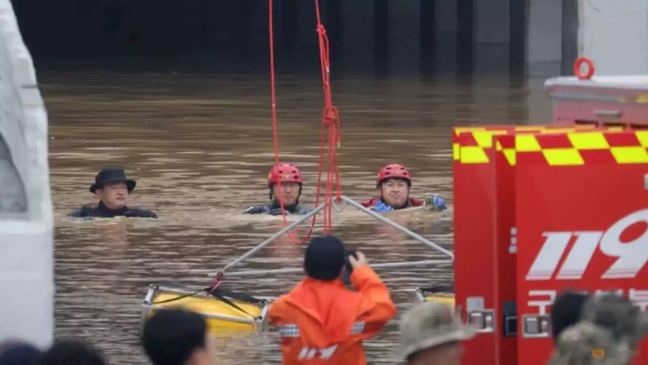 Rescuers retrieve eight bodies from flooded South Korea underpass