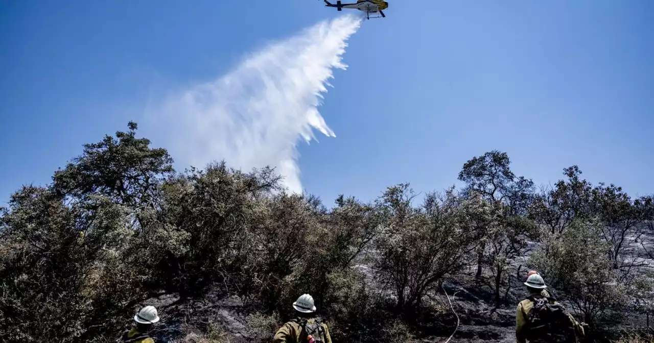 Firefighters battle 7,600-acre wildfire in Riverside County as heat wave scorches California